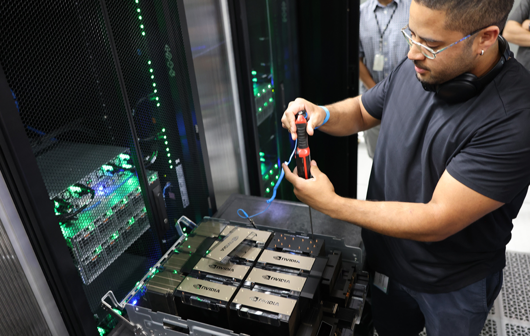 Engineer working on a GPU rack